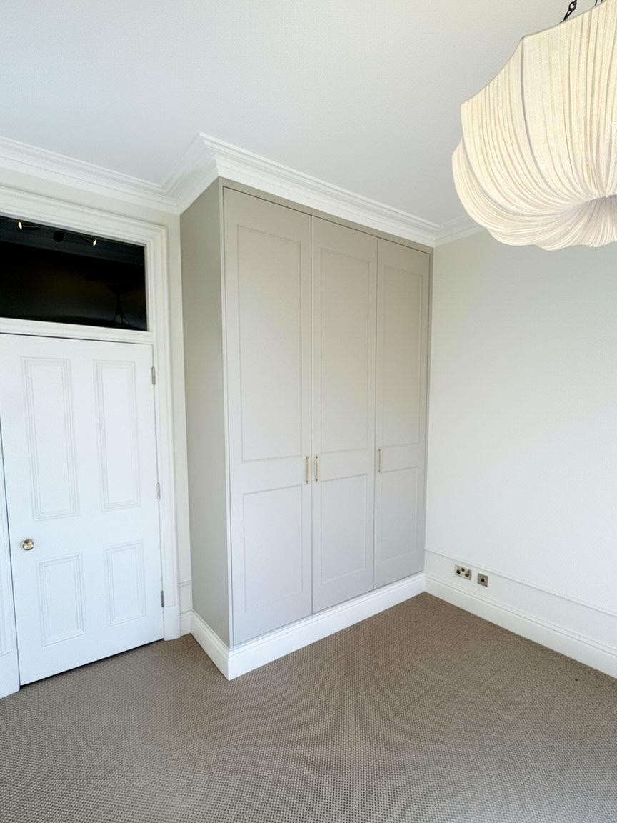 Shaker-style fitted wardrobes completed in Battersea