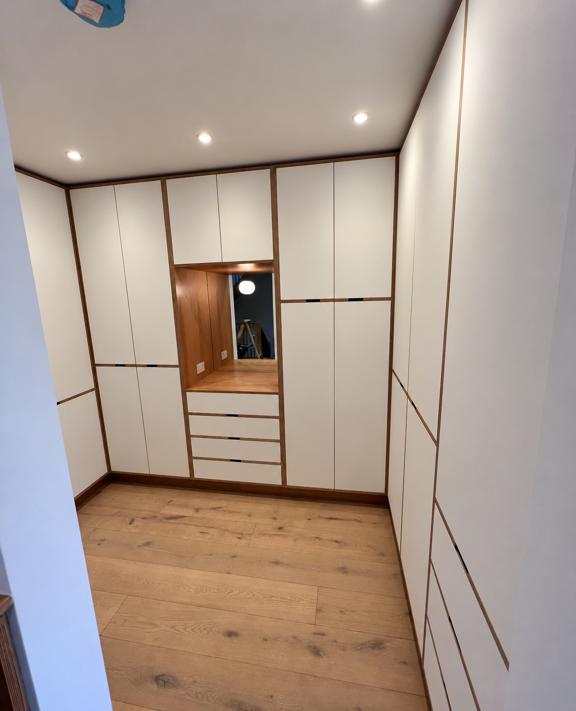 Another view of the birch ply walk-in wardrobe with sprayed MDF fronts